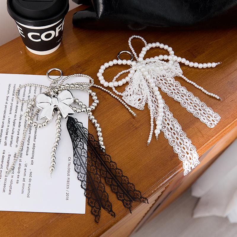 Korean style, trendy and unique pearl lace bow charm, fashionable and high-quality phone keychain,chaincharmsupply.com