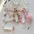 Mobile phone lanyard with pom-pom beaded wrist chain, short and fluffy,chaincharmsupply.com