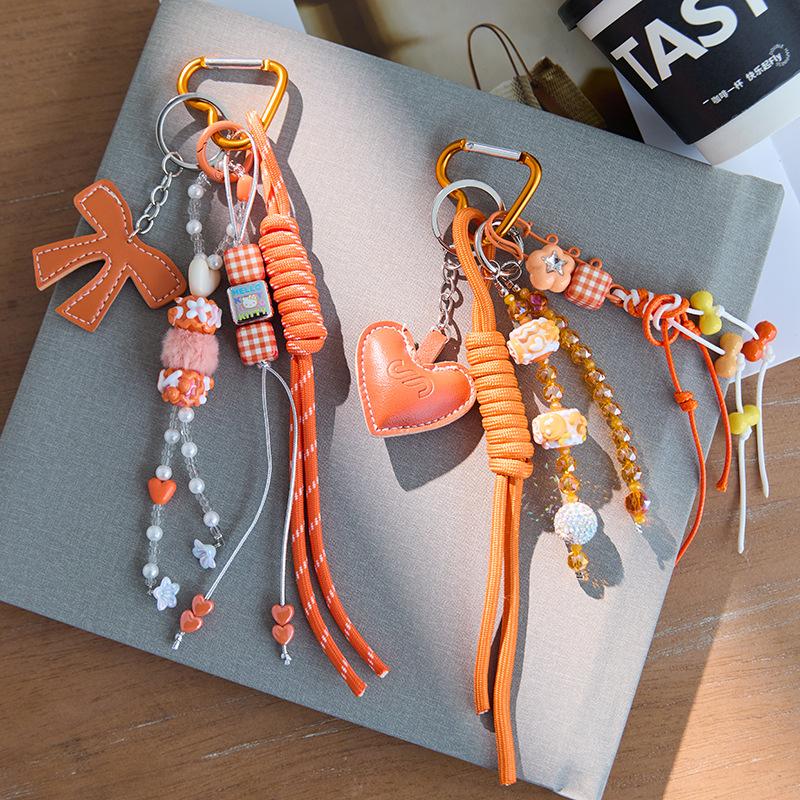 Roman style heavy-duty three-dimensional cotton-filled leather heart orange hand-woven bag pendant,chaincharmsupply.com