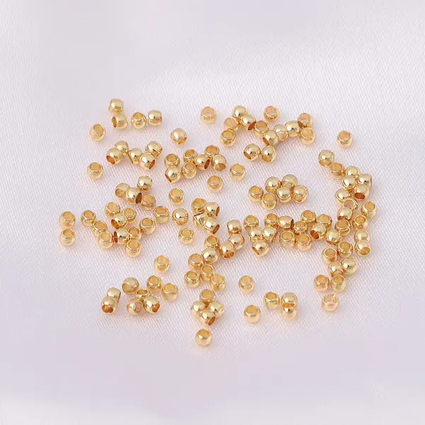 14K gold-coated spacer beads 2mm, hole diameter about 1mm, 100 pcs/pack,chaincharmsupply.com
