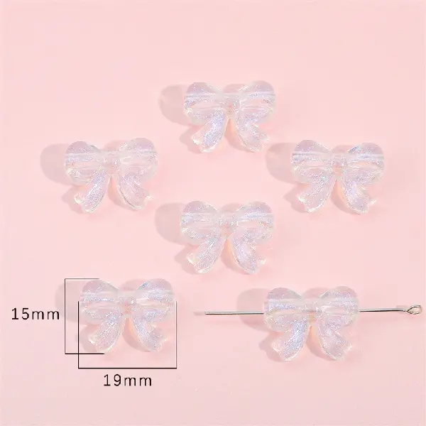 Bow tie 15x19mm, hole diameter about 1mm, about 20 pieces - one pack,chaincharmsupply.com