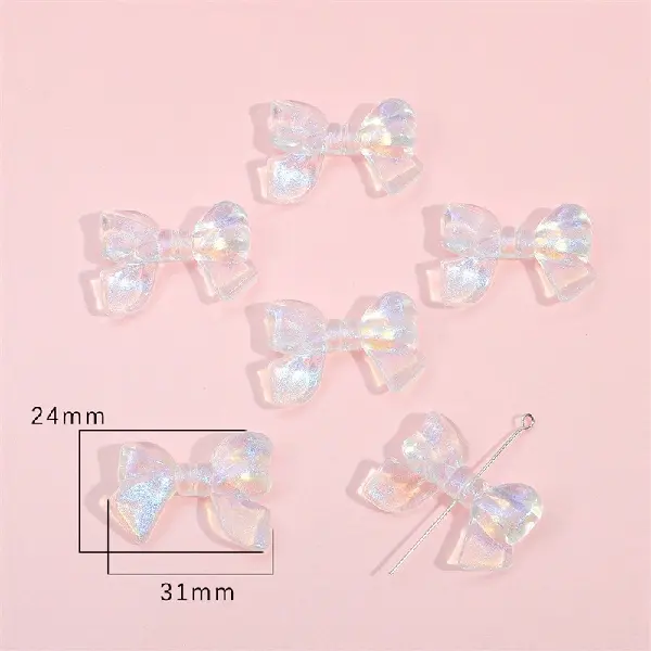 Bow tie 24x31mm, hole diameter about 1mm, about 10 pieces - one pack,chaincharmsupply.com