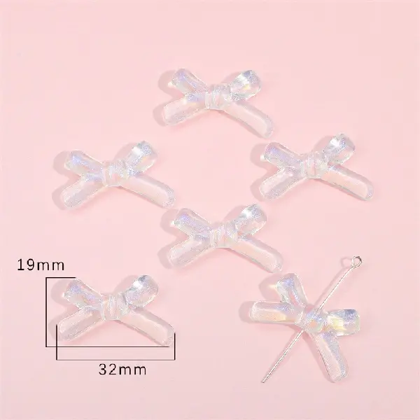 Bow tie 3 19x32mm, aperture about 1.5mm, about 16 pieces - one pack,chaincharmsupply.com