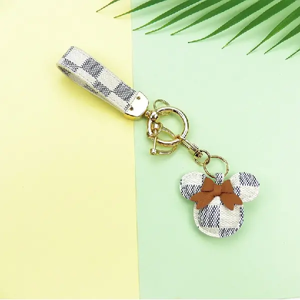 White grid + keychain,chaincharmsupply.com
