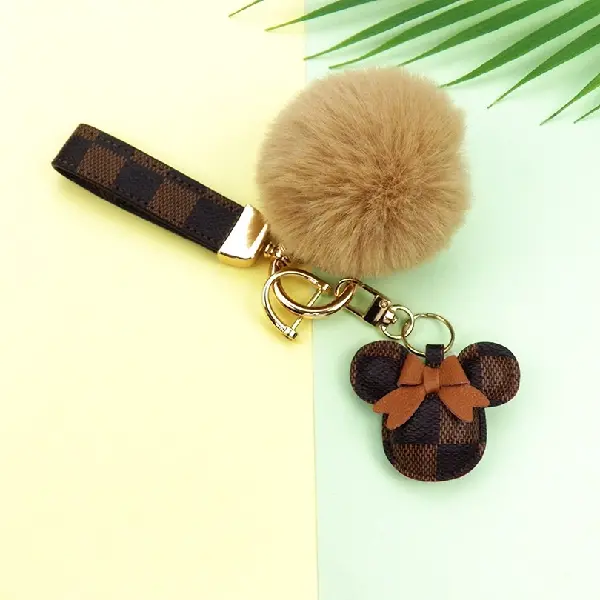 Brown grid + key chain + hair ball,chaincharmsupply.com