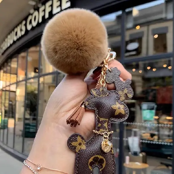 Brown flower+hair ball,chaincharmsupply.com