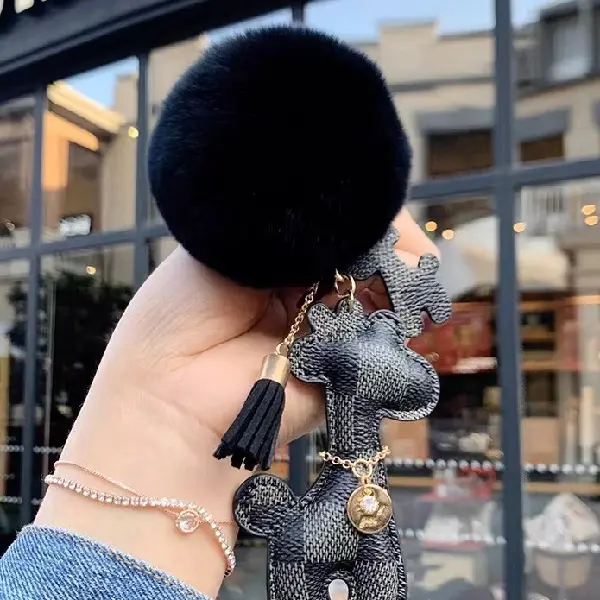 Black grid + fur ball,chaincharmsupply.com