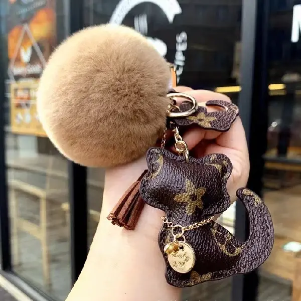 Brown flower+hair ball,chaincharmsupply.com