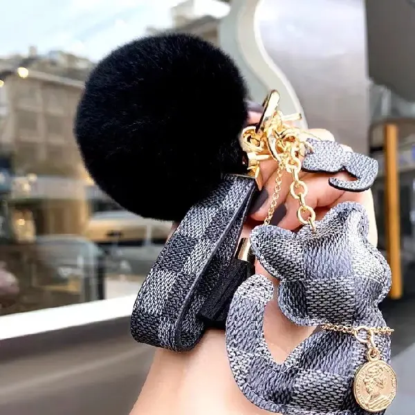Black grid + key chain + fur ball,chaincharmsupply.com