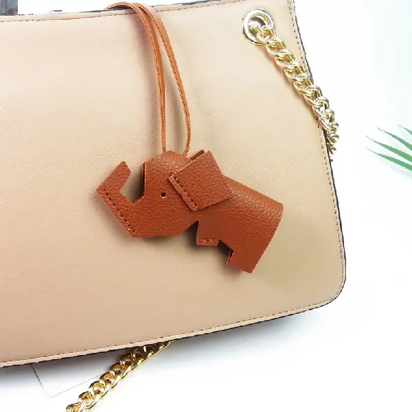 Light brown with leather cord,chaincharmsupply.com