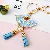 Wholesale Four-Leaf Clover Love Lock Keychains for Retailers - Flower fan blue-single OPP bag packaging
