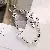 Wholesale Creative Smiling Star Phone Charms for Retailers - silver