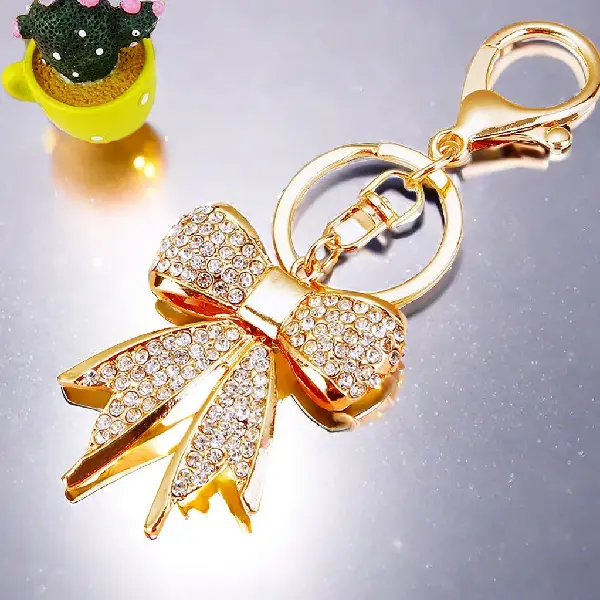 A573 full Rhinestone bow white - single OPP bag packaging,chaincharmsupply.com