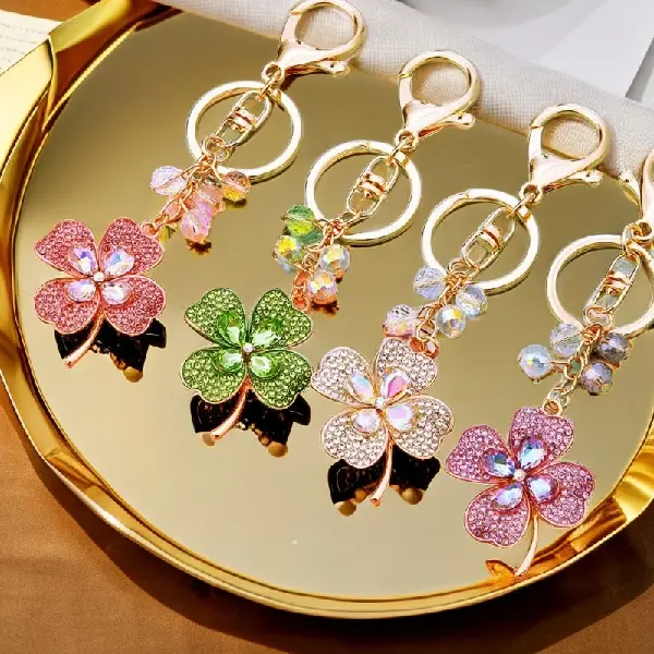 A132 double Rhinestone four-leaf clover color mixed hair-single OPP bag packaging,chaincharmsupply.com