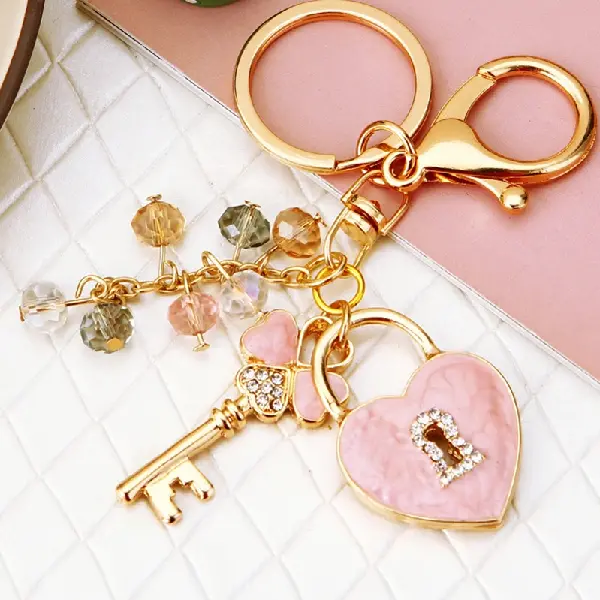 Four-leaf clover love lock pink-single OPP bag packaging,chaincharmsupply.com