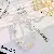 Wholesale Exquisite Crystal Phone Charm for High-End Retailers - White