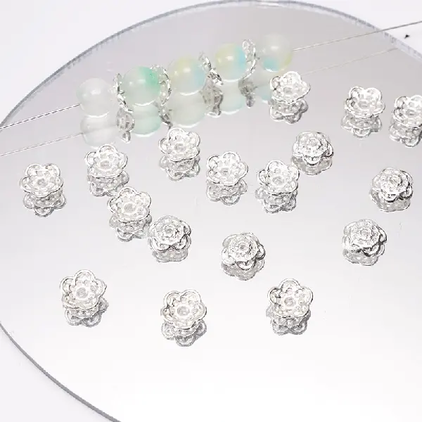 16 models, 9mm, aperture about 1mm, silver, 20 pcs/pack,chaincharmsupply.com