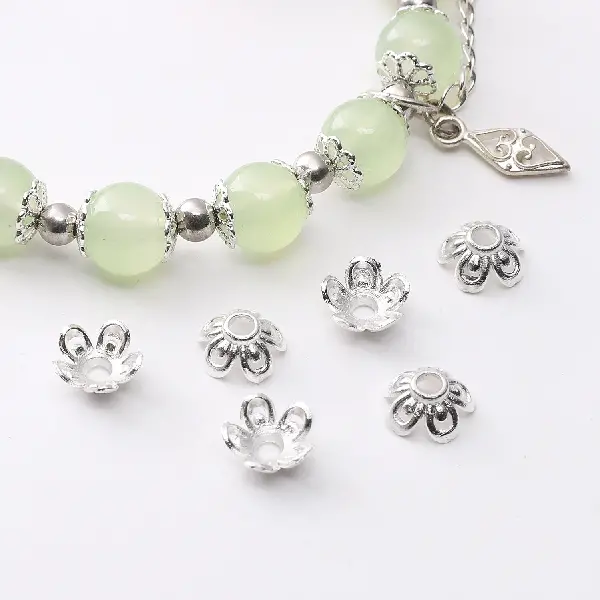 28 models, 8mm, aperture about 2mm, silver, 50 pcs/pack,chaincharmsupply.com