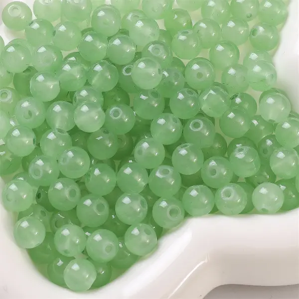 Light green-8mm aperture about 1.5mm 50 pieces/pack,chaincharmsupply.com