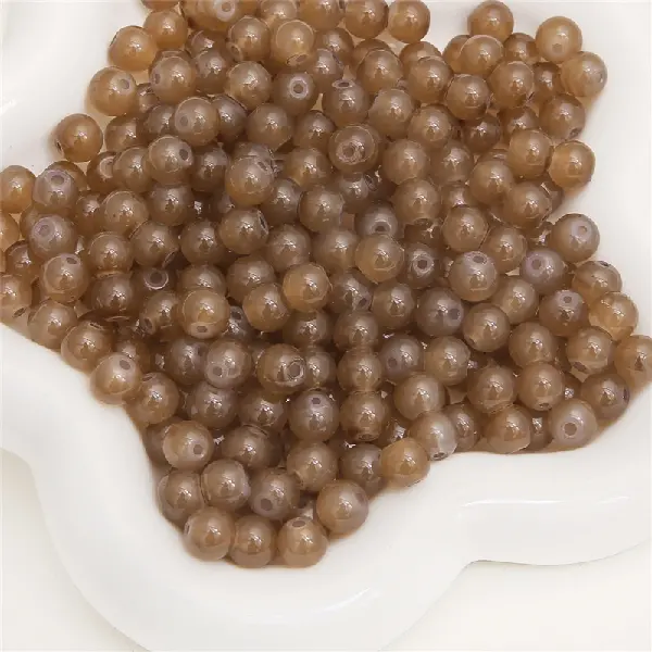 Dark brown color - 10mm, aperture about 1.5mm, 20 pieces per pack,chaincharmsupply.com