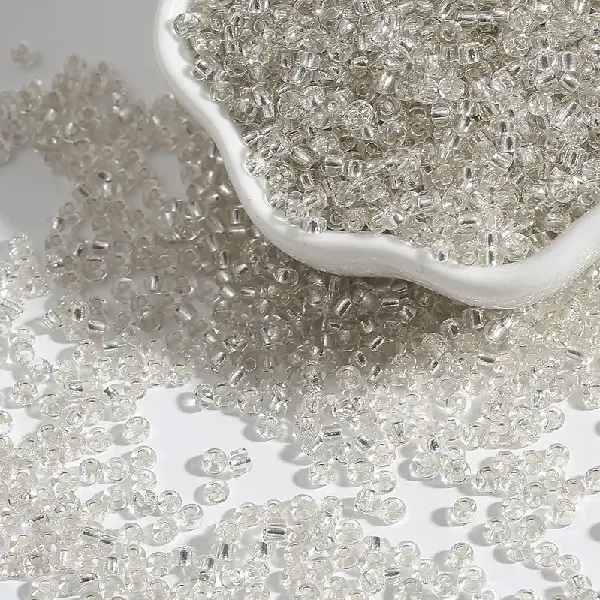 Silver white - 2mm aperture 0.6mm 15g/pack about 1000 pieces,chaincharmsupply.com