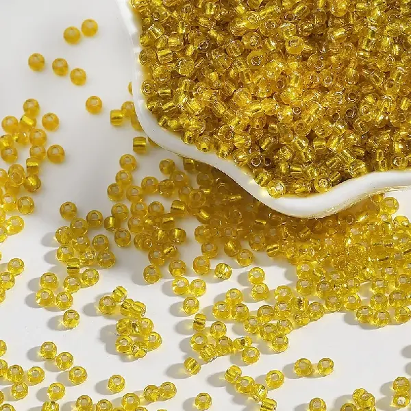 Yellow-4mm hole diameter 1mm 15g/pack about 150 pieces,chaincharmsupply.com
