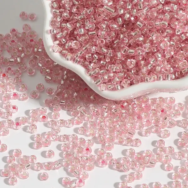 Pink-2mm aperture 0.6mm 15g/pack about 1000 pieces,chaincharmsupply.com