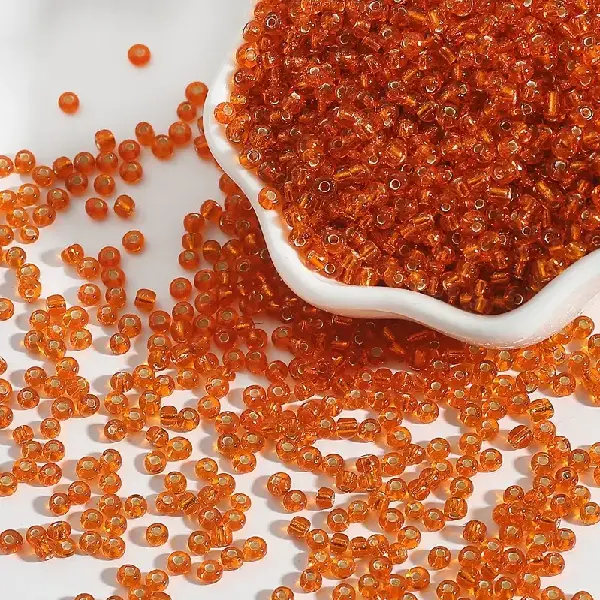 Orange-3mm aperture 0.8mm 15g/pack about 500 pieces,chaincharmsupply.com