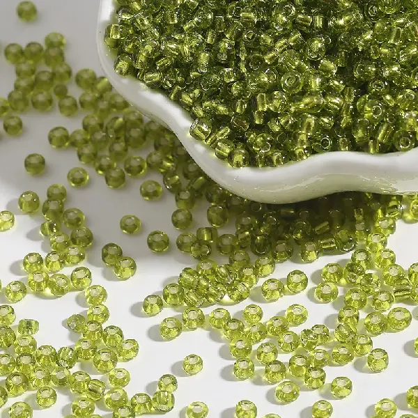 Light green-2mm aperture 0.6mm 15g/pack about 1000 pieces,chaincharmsupply.com