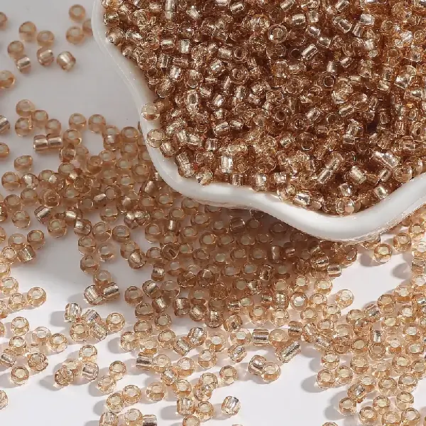Champagne color-4mm hole diameter 1mm 15g/pack about 150 pieces,chaincharmsupply.com