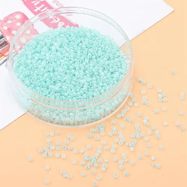 Light green-3mm hole diameter about 0.8mm 10g/pack about 220 pieces,chaincharmsupply.com