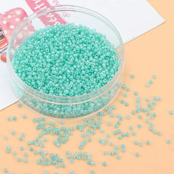 Dark green-2mm, hole diameter about 0.8mm, 10g/pack, about 660 pieces,chaincharmsupply.com