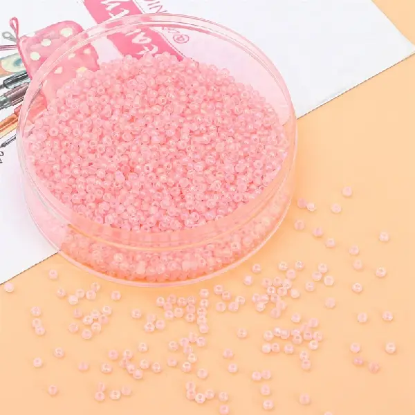 Silver red-3mm hole diameter about 0.8mm 10g/pack about 220 pieces,chaincharmsupply.com
