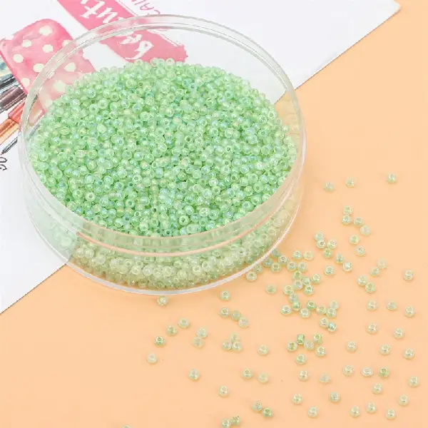 Light emerald green-2mm hole diameter about 0.8mm 10g/pack about 660 pieces,chaincharmsupply.com
