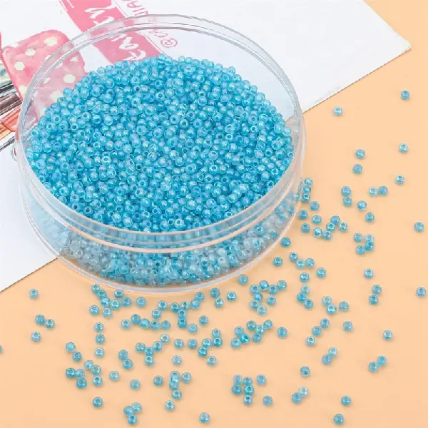 Cloud water blue-2mm aperture about 0.8mm 10g/pack about 660 pieces,chaincharmsupply.com