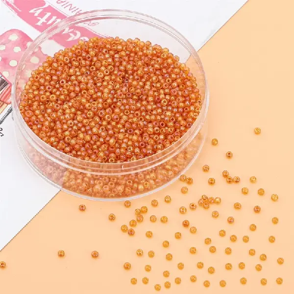 Brown-2mm, hole diameter about 0.8mm, 10g/pack, about 660 pieces,chaincharmsupply.com