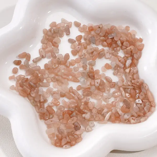 3-5mm, hole diameter about 0.5mm, 20 sunstones/pack,chaincharmsupply.com