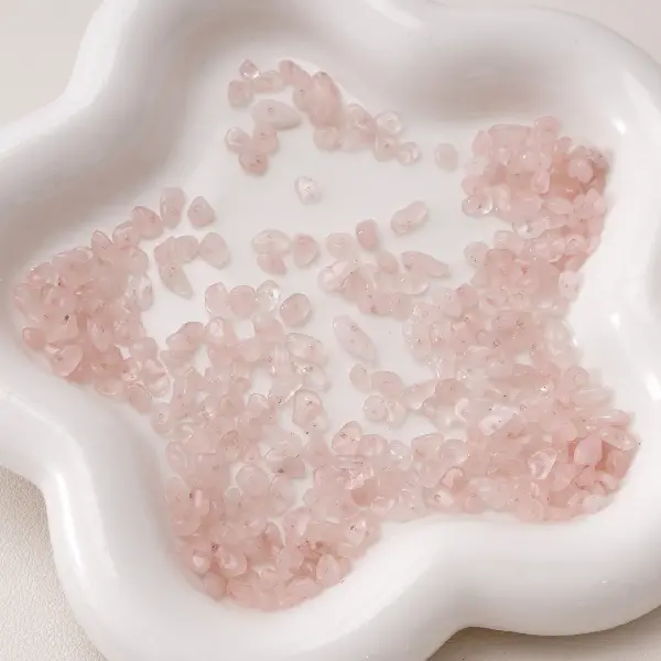 3-5mm, aperture about 0.5mm, 20 pieces of rose quartz/pack,chaincharmsupply.com