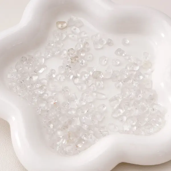 5-8mm, aperture about 0.5mm, white crystal 20 pieces/pack,chaincharmsupply.com