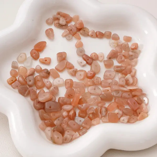 5-8mm, hole diameter about 0.5mm, 20 sunstones/pack,chaincharmsupply.com