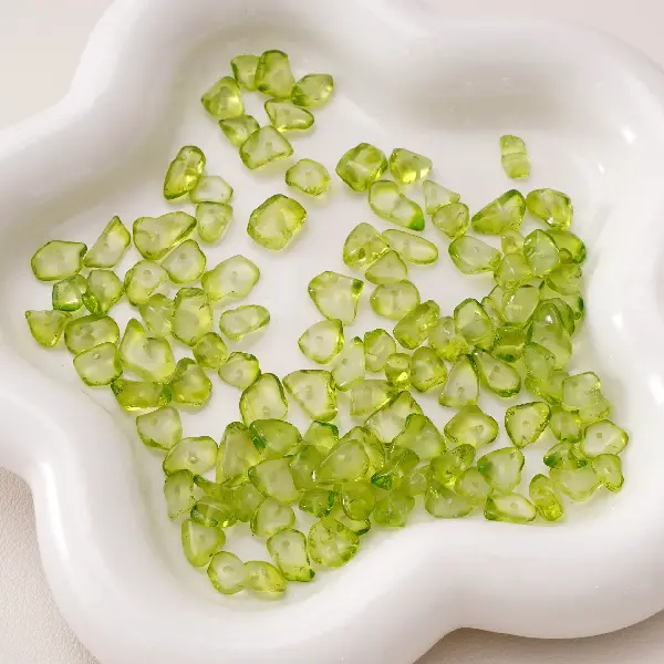 5-8mm, hole diameter about 0.5mm, 20 olives/pack,chaincharmsupply.com