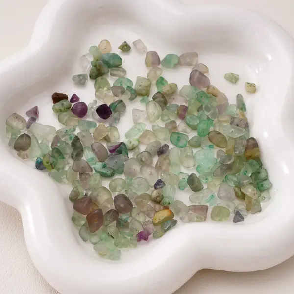 5-8mm, aperture about 0.5mm, 20 fluorite stones/pack,chaincharmsupply.com