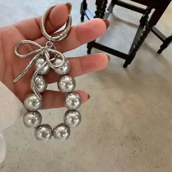 Large silver bow,chaincharmsupply.com