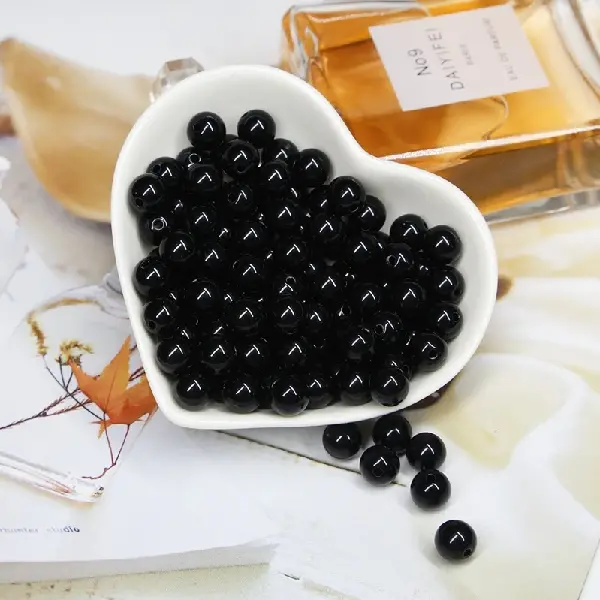 Black - diameter 10mm, hole diameter 2mm, about 50 pieces/pack,chaincharmsupply.com