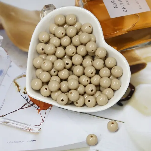 Light brown color - diameter 8mm, hole diameter about 1.8mm, about 100 pieces/pack,chaincharmsupply.com