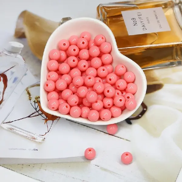 Coral red - diameter 14mm, hole diameter about 1.5mm, 50g/pack (about 30 pieces),chaincharmsupply.com