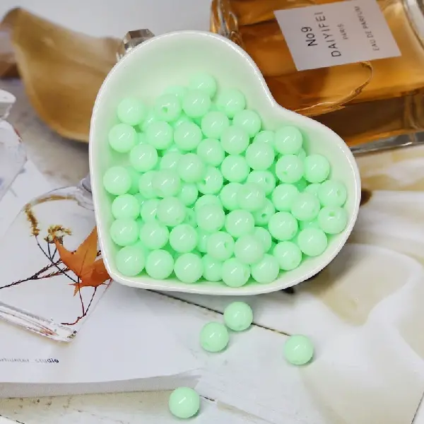 Light green - diameter 14mm, hole diameter about 1.5mm, 50g/pack (about 30 pieces),chaincharmsupply.com