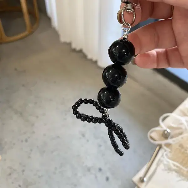 Three pearl black bows,chaincharmsupply.com