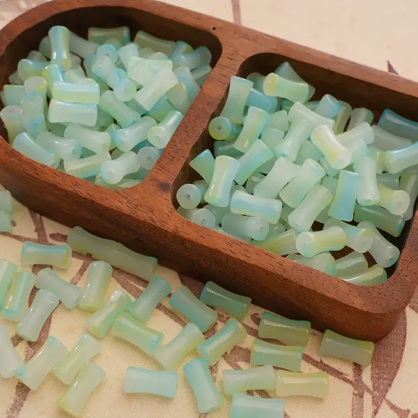 Four green-6x12mm, aperture about 1mm, 20 pieces/pack,chaincharmsupply.com