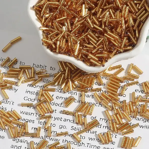 Golden yellow - diameter about 2mm x length about 7mm 15g/pack about 300 pieces,chaincharmsupply.com